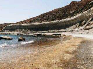 The scenic rocky coastline and clay cliffs near Qbajjar Bay, a popular walking spot just outside Marsalforn.